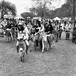 Donkey Derby held for charity at Festival Gardens. Bunny girls