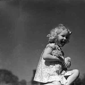 Ella Edwards with some baby chicks. 1940