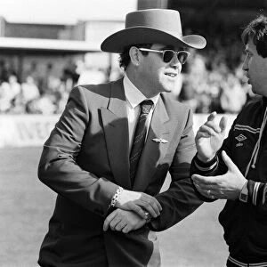 Elton John and Graham Taylor at the Watford v Liverpool football match, 14th May 1983