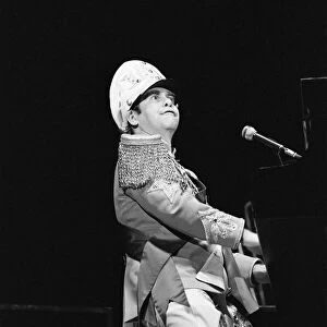 Elton John performing in concert at the Birmingham Odeon during his "