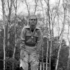 Elton John, singer, pictured at home in Virginia Water, in 1973