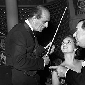 English bandleader and violinist Bert Ambrose pictured at the Cafe de Paris ballroom in