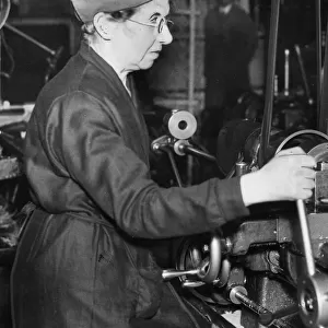 Factory worker Mrs C Kyle at work in a Birmingham munitions factory during the Second