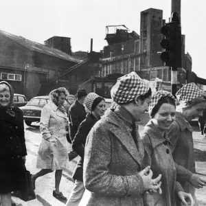 Female workers of the Tate and Lyle sugar refinery in Liverpool make their way to