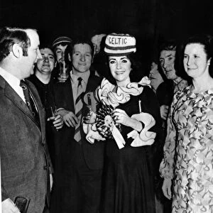 Film actress Elizabeth Taylor, made an honorary Celtic fan after flinging a £