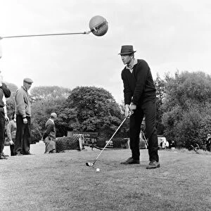 Filming the golf scene for "Goldfinger"at Stoke Park golf course near Stoke