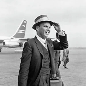 Frank Sinatra seen here arriving at Heathrow airport in the summer of 1961