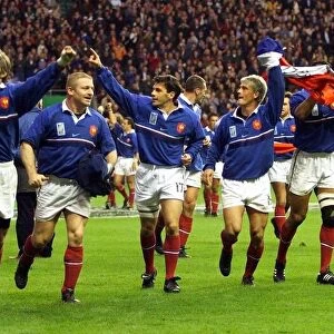 The French team celebrate beating New Zealand in the Rugby World Cup semi-final at