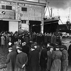 General scenes showing workers gathered at Gladstone Docks in Liverpool