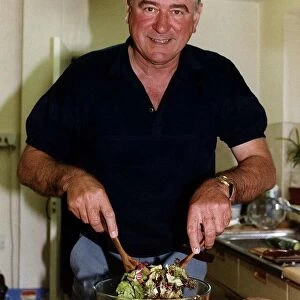 George Baker actor preparing salad in his kitchen dbase A©Mirrorpix