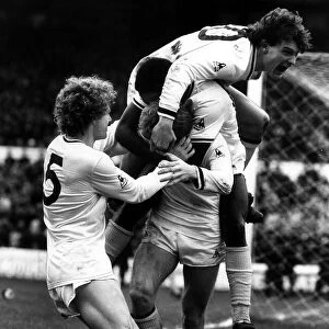 Glenn Hoddle leaps on top of his teamates after Spurs had scored the winner against