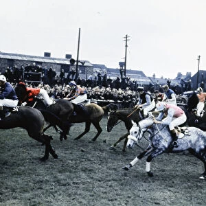 Grand National Horserace held at Aintree, Liverpool. Jeremy Hindly on Tam Kiss (25