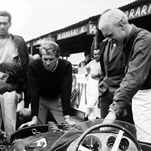 Grand Prix Ferrari drivers Peter Collins with Mike Hawthorn in Ferrari pits