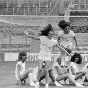 A group of model girls, known as The Exhibitionists, are training for a 5-a-side football