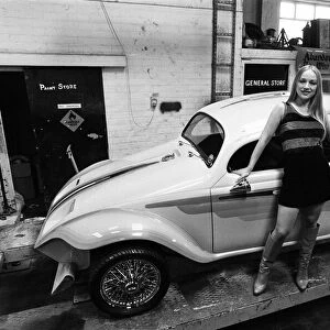 Helen Szabo with a customised Volkswagen Beetle Supercar