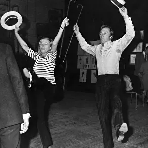 Honor Blackman dancing with John Neville during rehearsals for stage play Mr