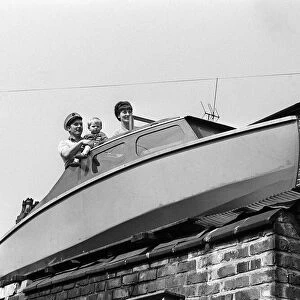 Houseboat April 1968 - Boat on roof for Worthington Family - 8 feet up on roof behind