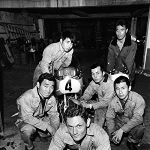 Isle of Man TT Races 1967. Honda Team mechanics, led by Nobby Clark