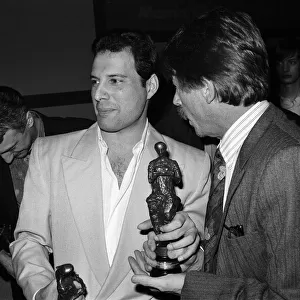 The Ivor Novello Awards. Pictured, John Deacon and Freddie Mercury of Queen with their
