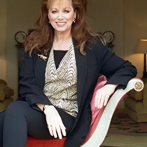 Jackie Collins. (Pictured in London) Author