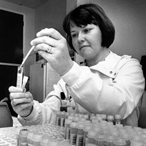 Jenny Wright, a medical laboratory scientific officer, preparing a batch of samples at