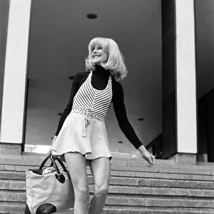 Jilly Johnson, model, wearing short skirt, London. 23rd April 1976