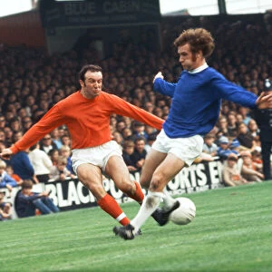 Jimmy Armfield, (playing in orange, for Blackpool) in a playing situation against Everton