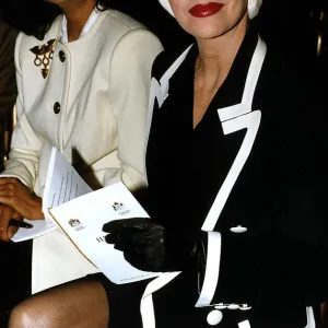 Joan Collins Actress and Shakira Caine sit side by side at a fashion show in London