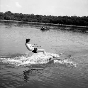 Jockey Lester Piggott enjoys some time off with a session of waterskiing, June 1954