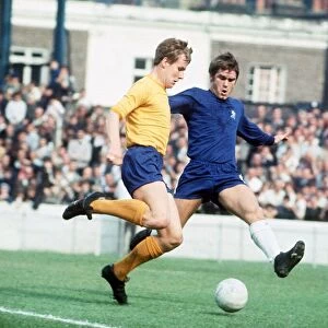 Joe Royle playing for Everton against Chelsea David Webb attempting to tackle him