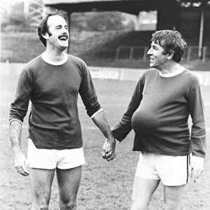 John Cleese Actor with fellow Actor Peter Cook at a Charity Football Match