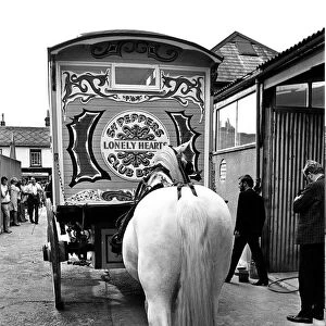 John Lennons gaily painted gipsy caravan, on its way to his home