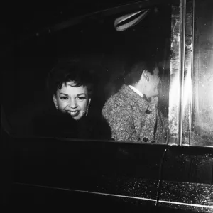 Judy Garland and her daughter Liza Minelli drive away from Covent Garden opera house with