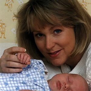 Kathryn Holloway TV Presenter of UK Livings Agony Programme with baby son James Holloway