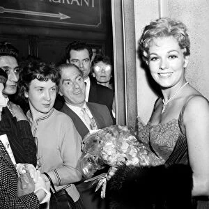 Kim Novak attends the premiere of the Middle of the Night. June 1959