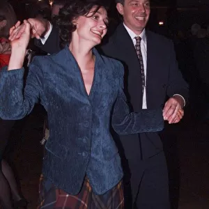 Labour leader Tony Blair and wife Cherie Blair dance together at the party