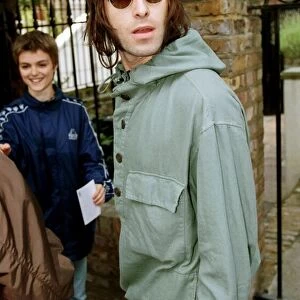 Liam Gallagher of Oasis singer leaving his London home on the day drummer Bonehead