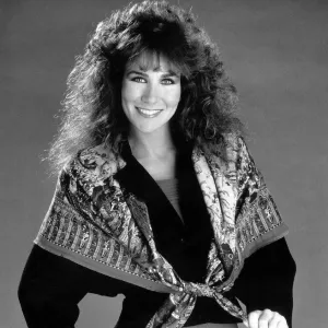 Linda Lusardi Model Ex Page 3 girl wearing a scarf over a jumper and a skirt