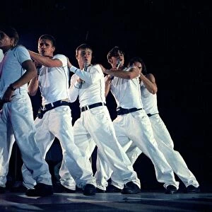 Take That live on stage during a concert. 26th August 1993