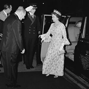 Her Majesty Queen Elizabeth II, is greeted by Media mogul Lew Grade (left)