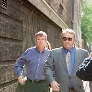 Manchester United manager Alex Ferguson arriving at Bootle Police station where captain