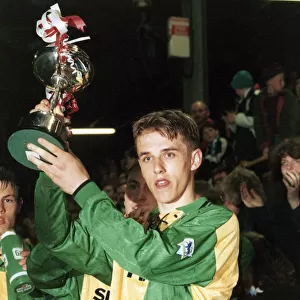 Manchester United youth team captain Philip Neville holds up the FA Lancashire Youth Cup