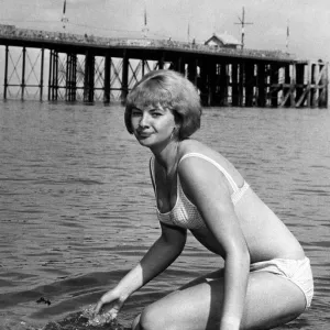 Mandy Rice-Davies, who is in South Wales in the Cabaret, pictured in the sea at Penarth