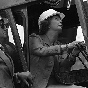 Margaret Thatcher ex Prime Minister controls a crane in a building site 1986