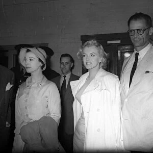 Marilyn Monroe with new husband Arthur Miller and actress Vivien Leigh at press