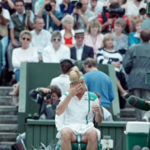 Martina Navratilova seated during a break at the Wimbledon final against Steffi Graf