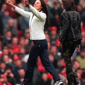 MEL C OF THE SPICE GIRLS GIVES THE V SIGN TO MANCHESTER UNITED FANS WHO TAUNTED HER WITH