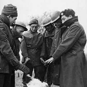 Men of the RAF Regiment keeping out the cold on the Italian front