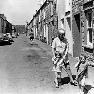 Merthyr - Old - Parents watch over their children in Mary Ann Street, Dowlais