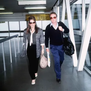 Michael Caine and Jackie Collins on their way to Los Angeles September 1985